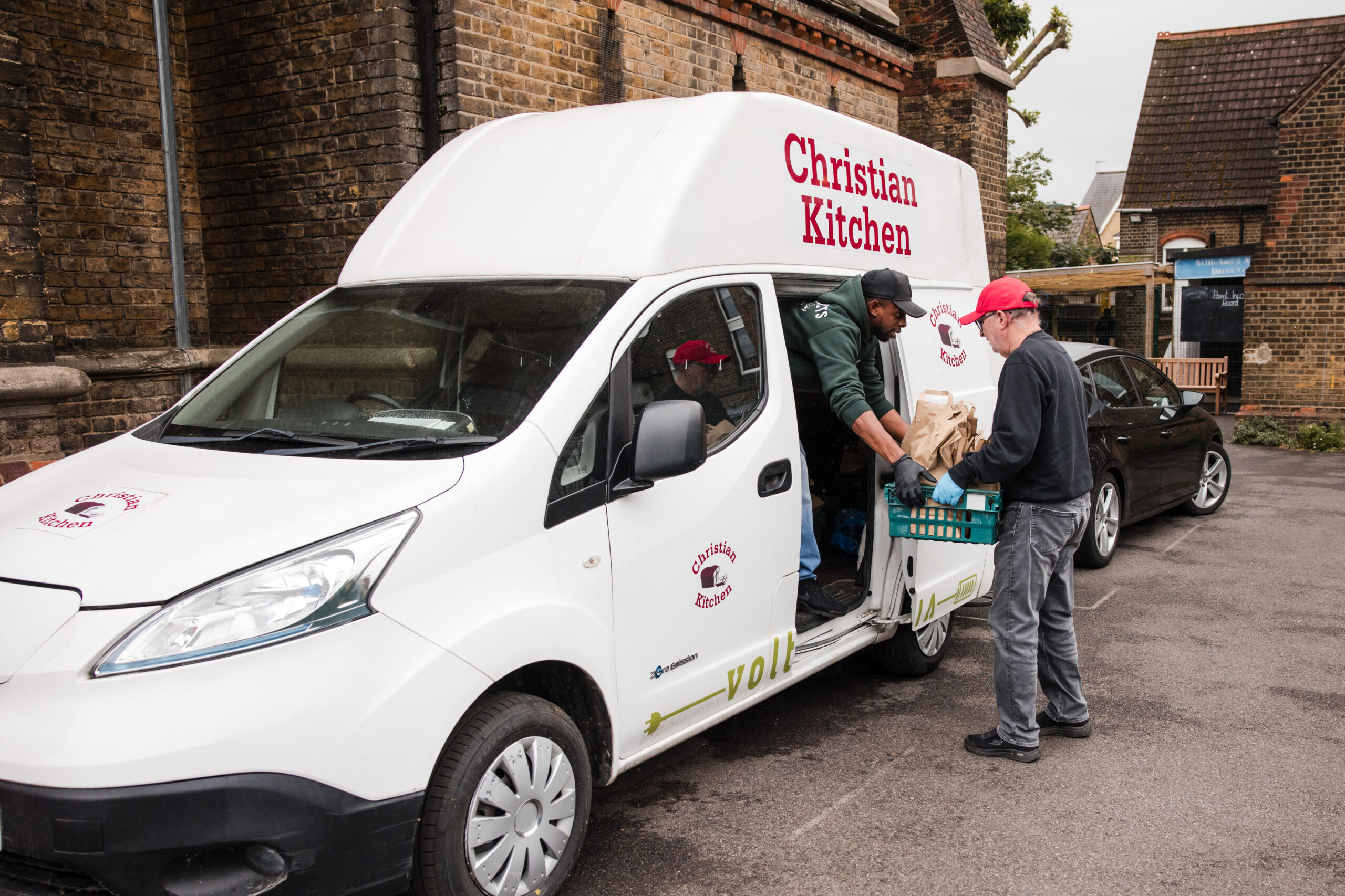 Loading the meals in to Christian Kitchens van