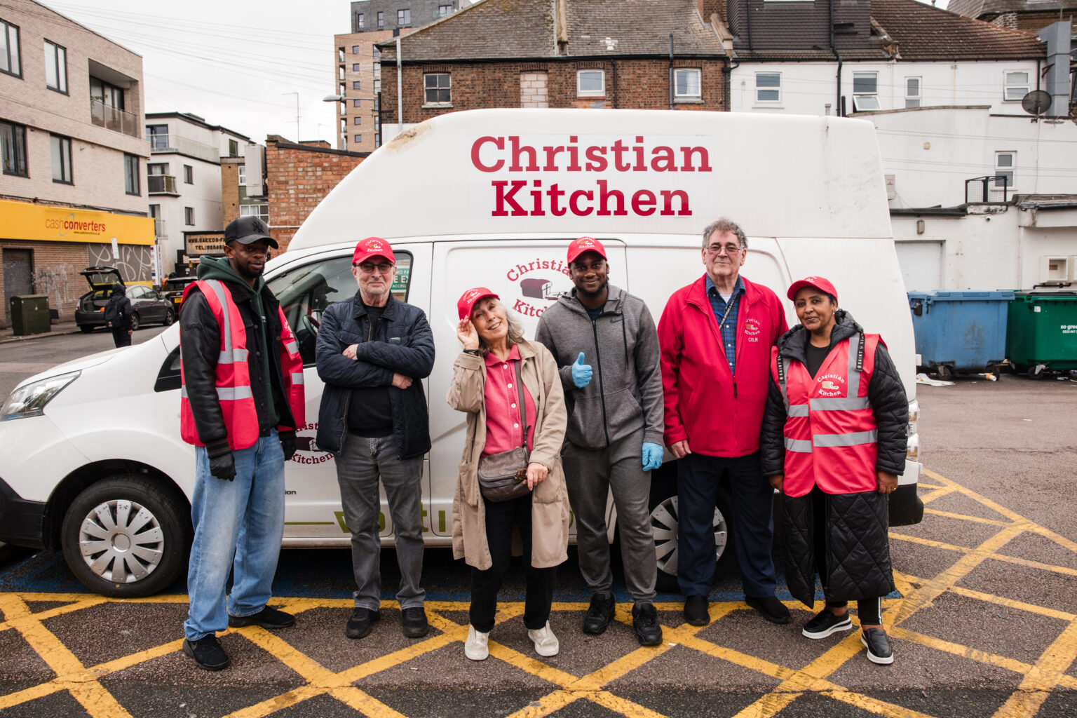 Christian Kitchen team with van after delivery